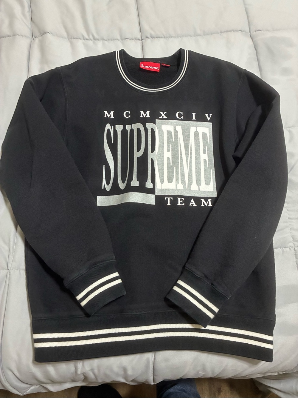 Supreme Black Crewneck Sweatshirt with Silver 'SUPREME TEAM' Graphic